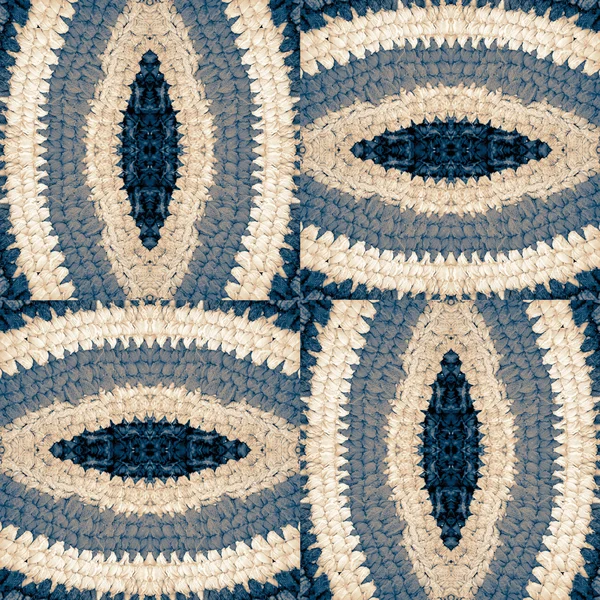 Абстрактный рисунок из вязаных частей коврика — стоковое фото